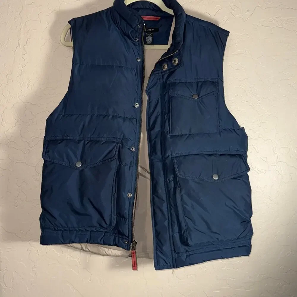 J. Crew men’s blue down filled puff vest size medium.